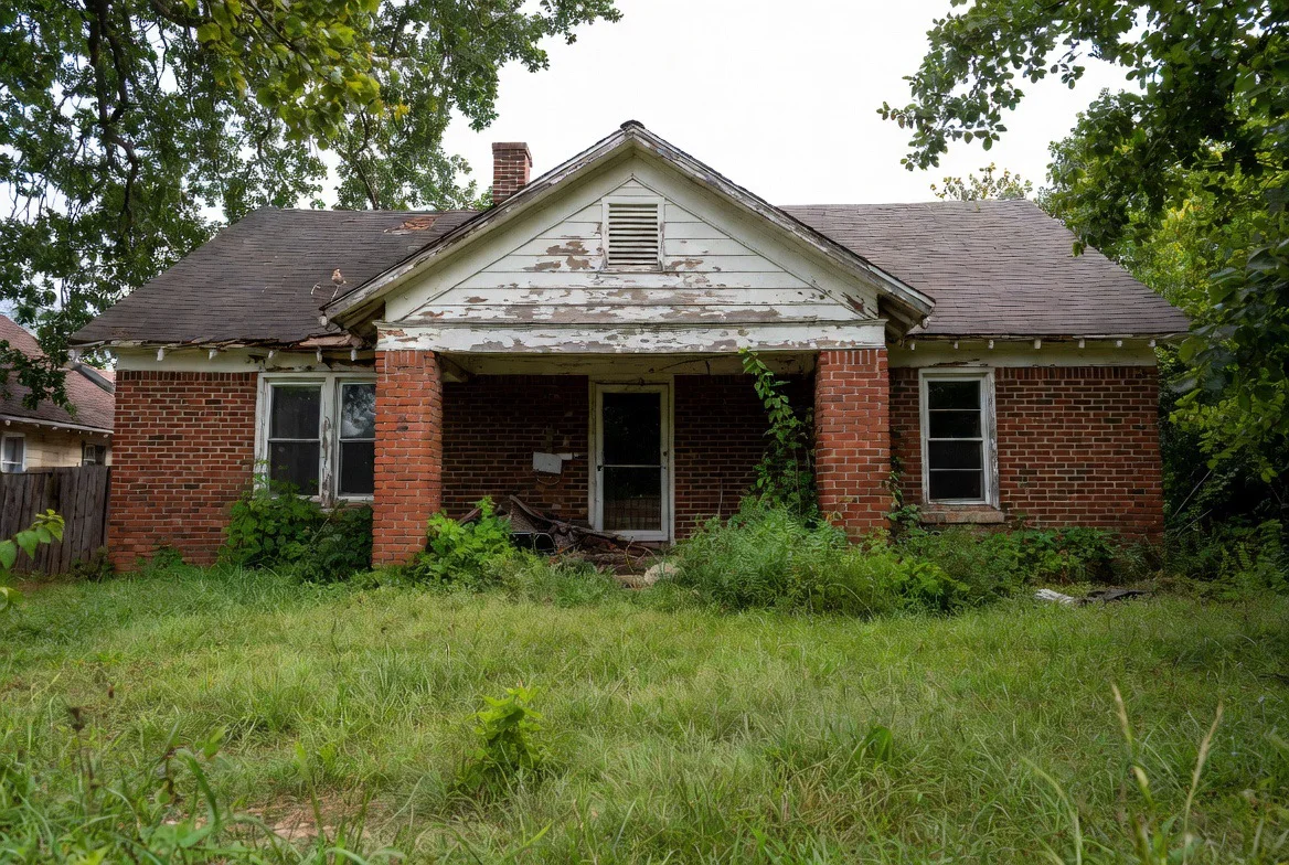 Distressed Dallas inherited home showing deferred maintenance that we purchase as-is for cash